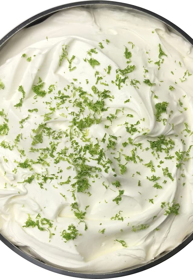 White cream gelato dusted with fresh green lime zest